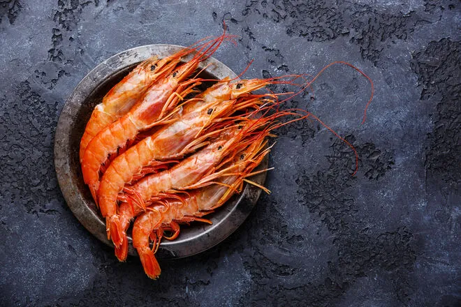 raw prawns in a metal bowl