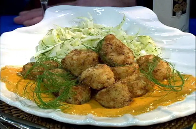 Jasper White’s Crispy Fried Scallops with Fennel Slaw served on large white seashell plate