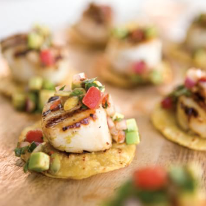 California Grilled Scallops with Avocado Salsa served on tortilla chips